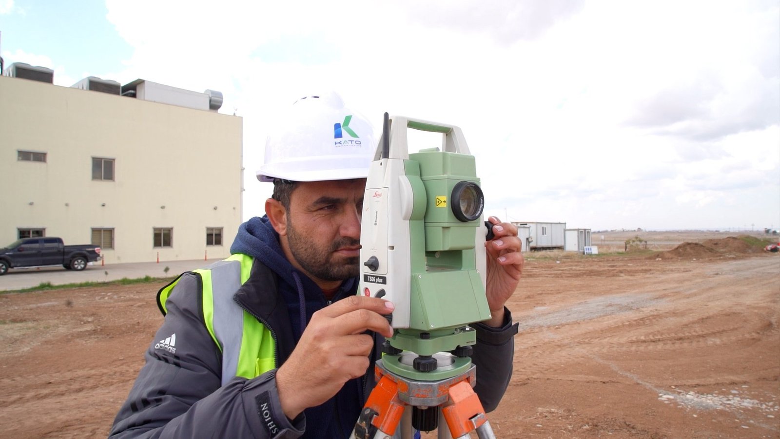 KATO surveyor operating a total station