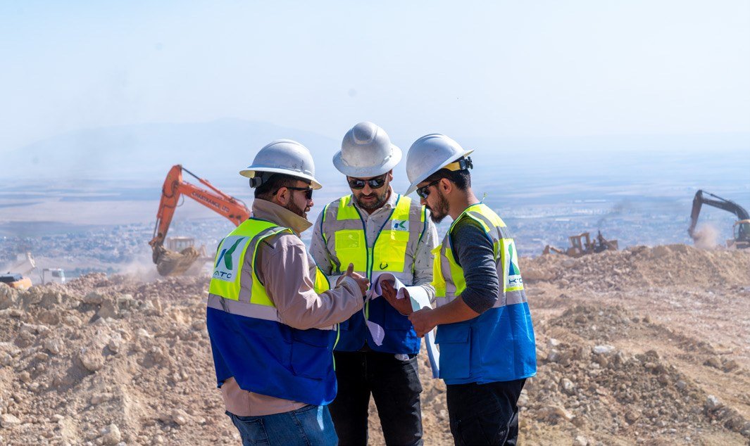 Professionals reviewing construction plans